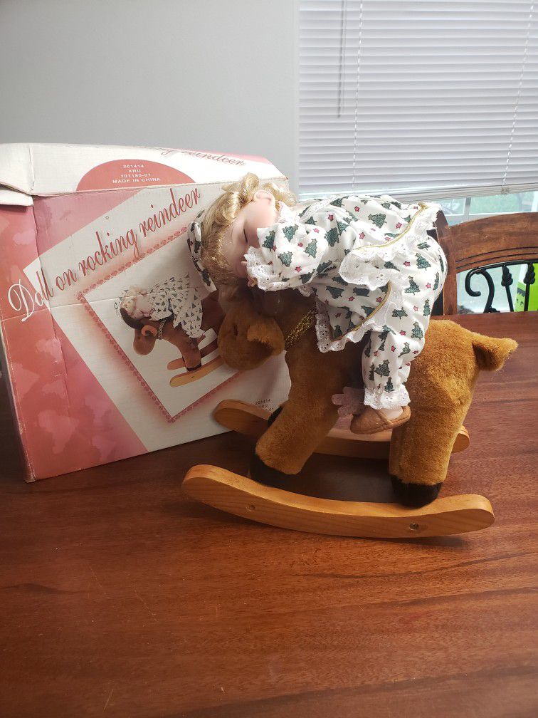 Antique Doll On Rocking Horse 