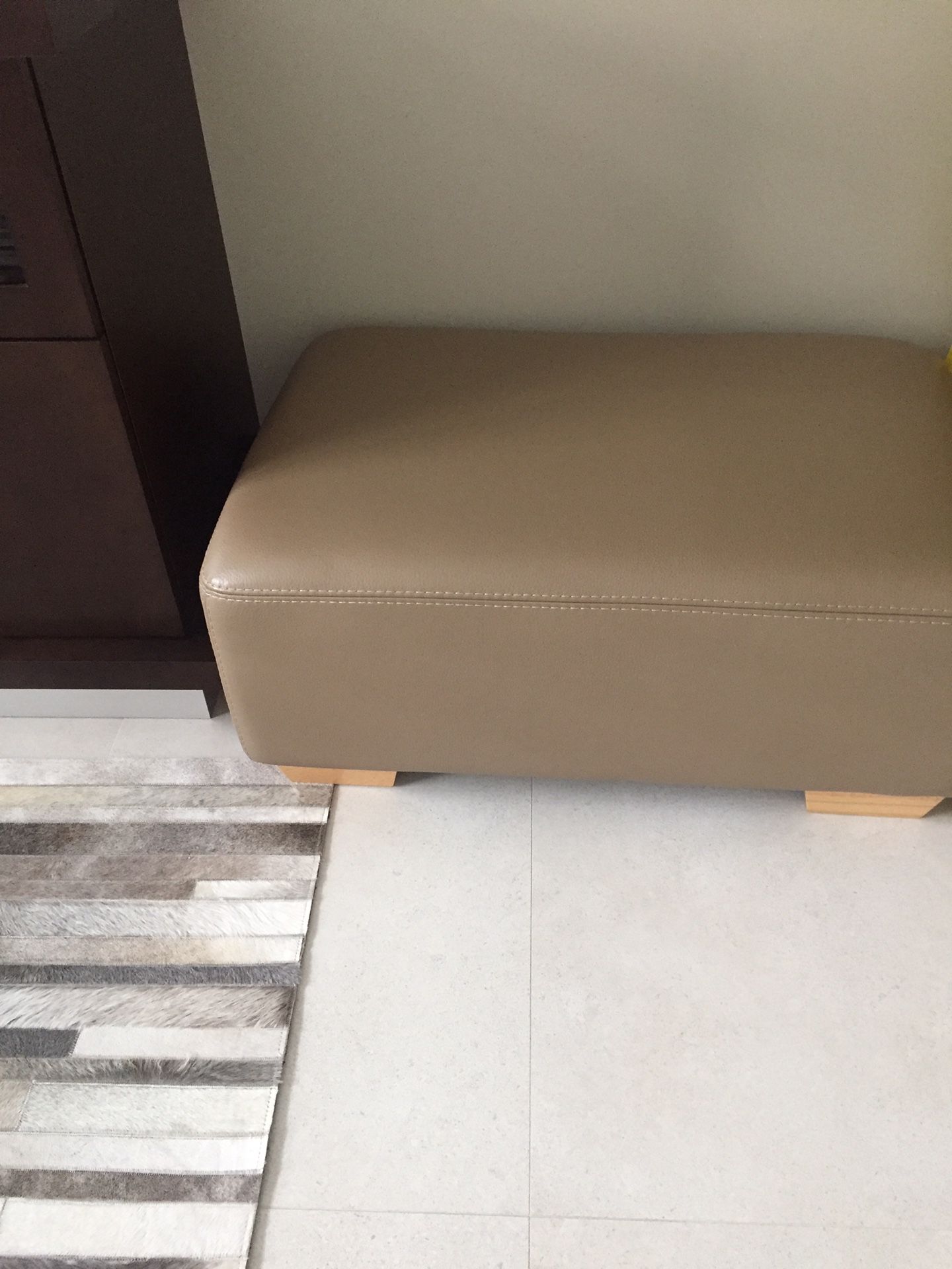 Taupe leather ottoman like brand new
