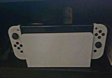 Nintendo Switch Oled with dock and games