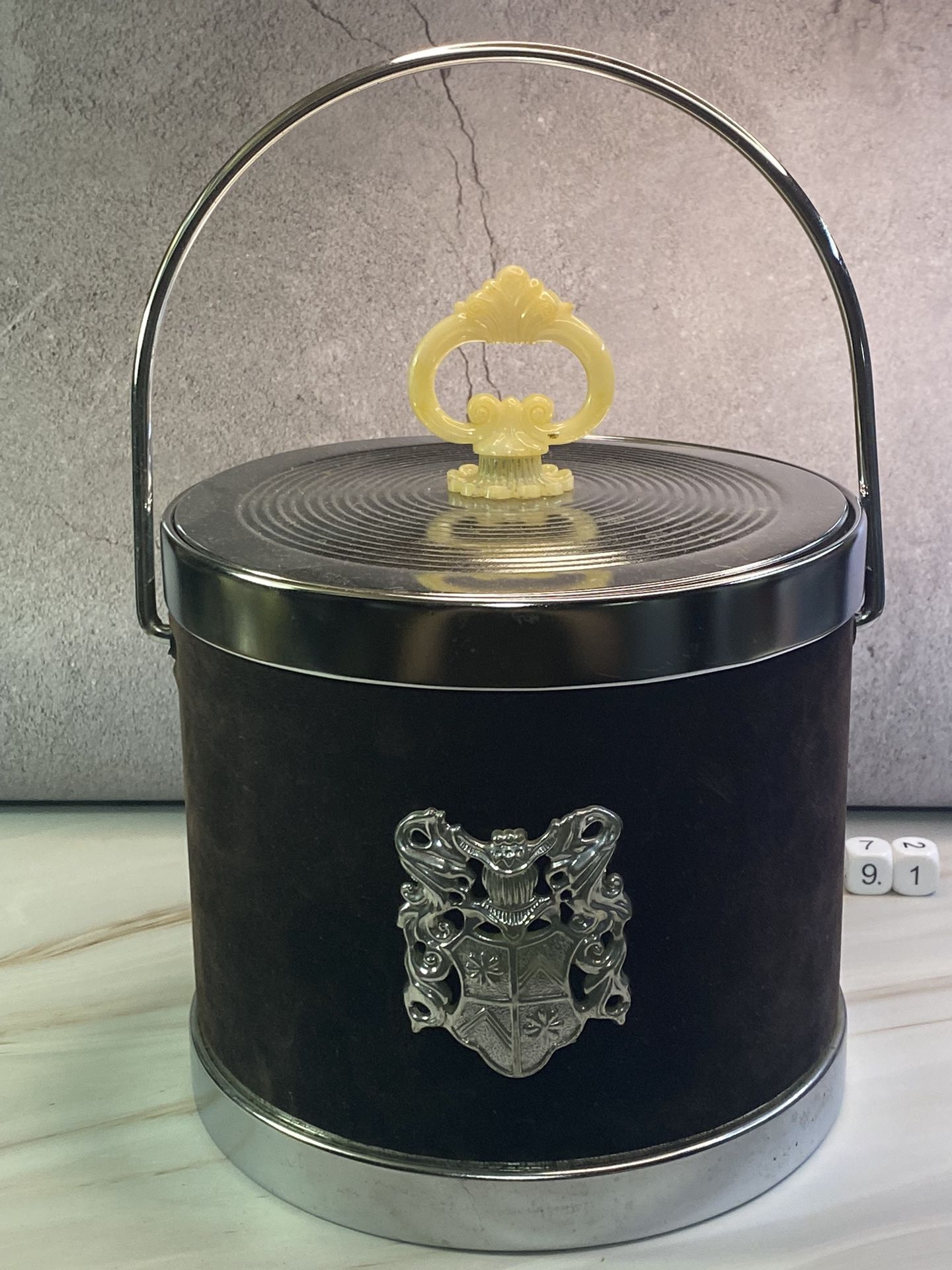 Vintage Ice Bucket wrapped in dark brown velvet and silver plastic heraldic shield, made in Hong Kong circa 1960s, Mid Century barware. 