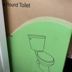 Round toilet (brand New In Box)