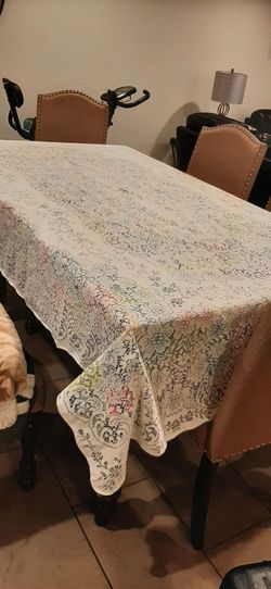 Elegant vintage ecru lace tablecloth.