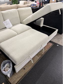 2 piece Sectional on sale( pull out bed & storage chaise)