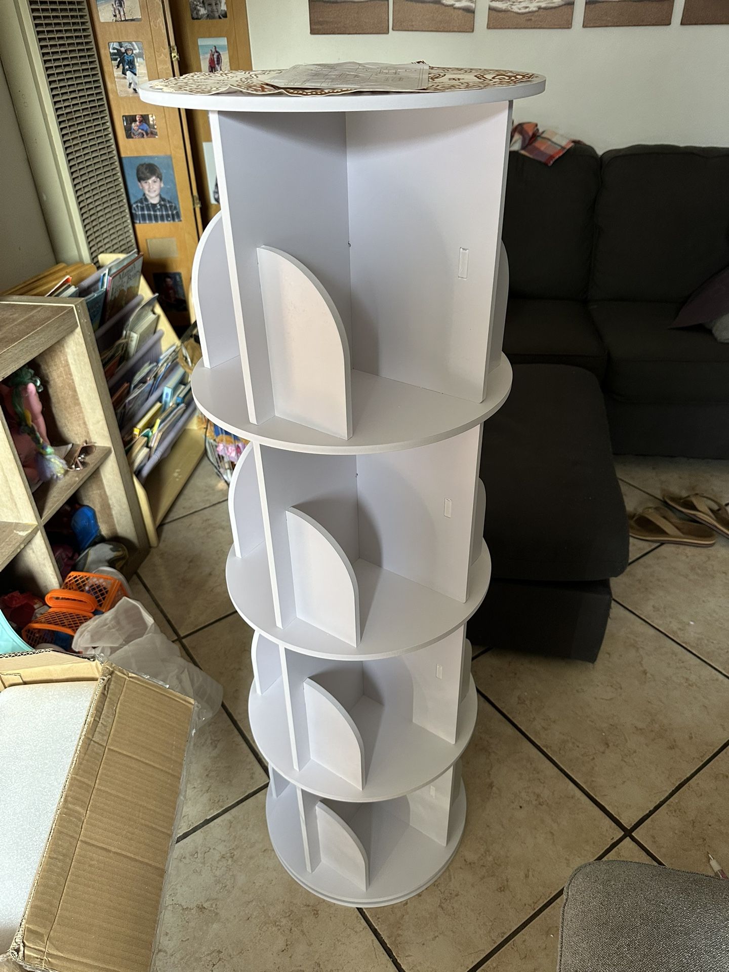 New four tier rotating bookshelf