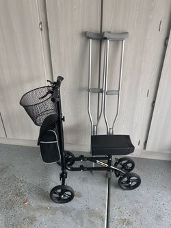 Knee scooter and crutches