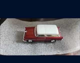 Red and White Classic Car Die-Cast Model