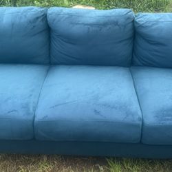 Vibrant and Plush Teal Sofa