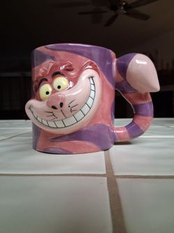 ĹÕÔK! Disney Rare VTG Cheshire Cat Coffee Mug Cup Pink Purple Alice and Wonderland...asking $20.00