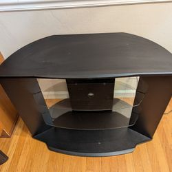 black media console/TV stand with 2 glass shelves.