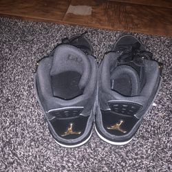 Royalty Black Jordan 4s