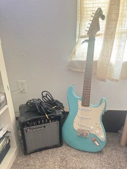 Squier Electric Guitar Bundle + Guitar Bag, Ibanez Amp, Tuner, Capo & Cables
