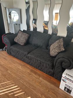 Black upholstery couch.