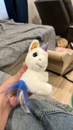 Unicorn Albert Einstein cuddle with