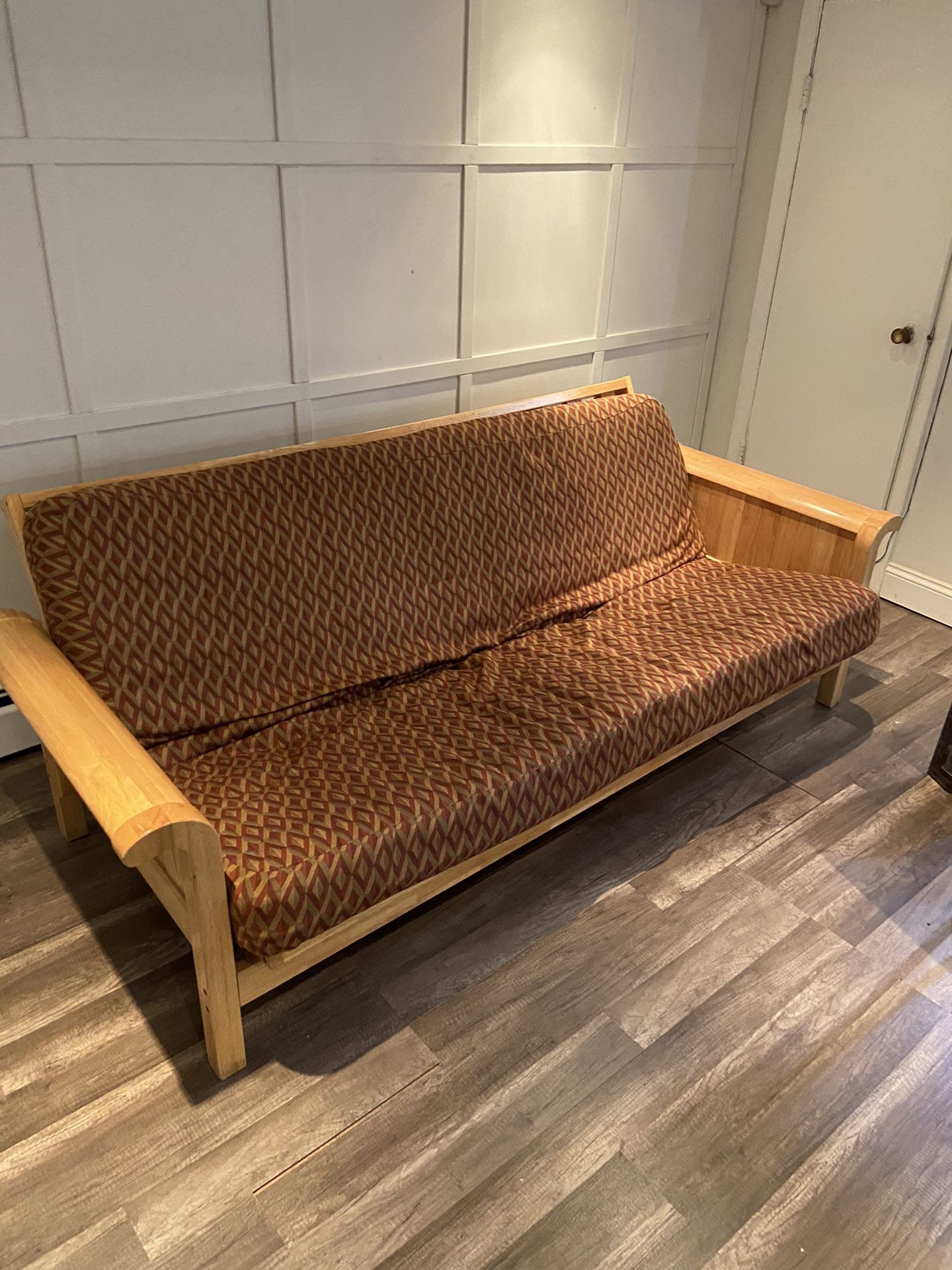 Used wooden futon with fabric cover