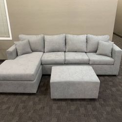 New Grey Sectional And Ottoman 