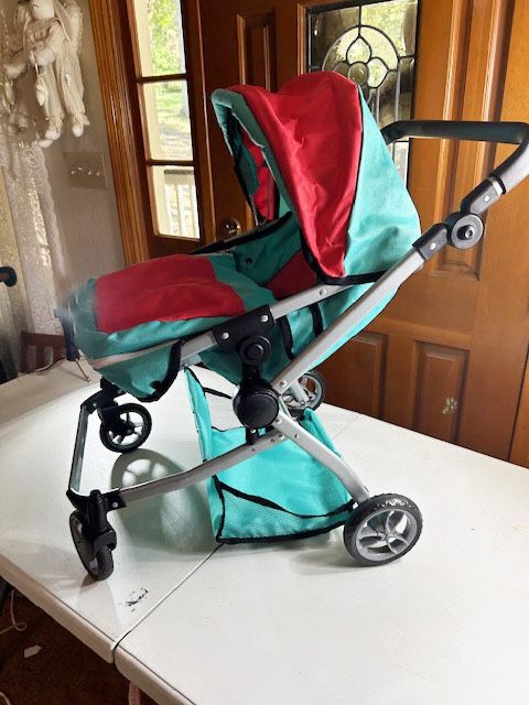 New, Turquoise & Red Twin Doll Stroller Foldable Pram