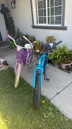 Men, blue bike and woman, purple bike