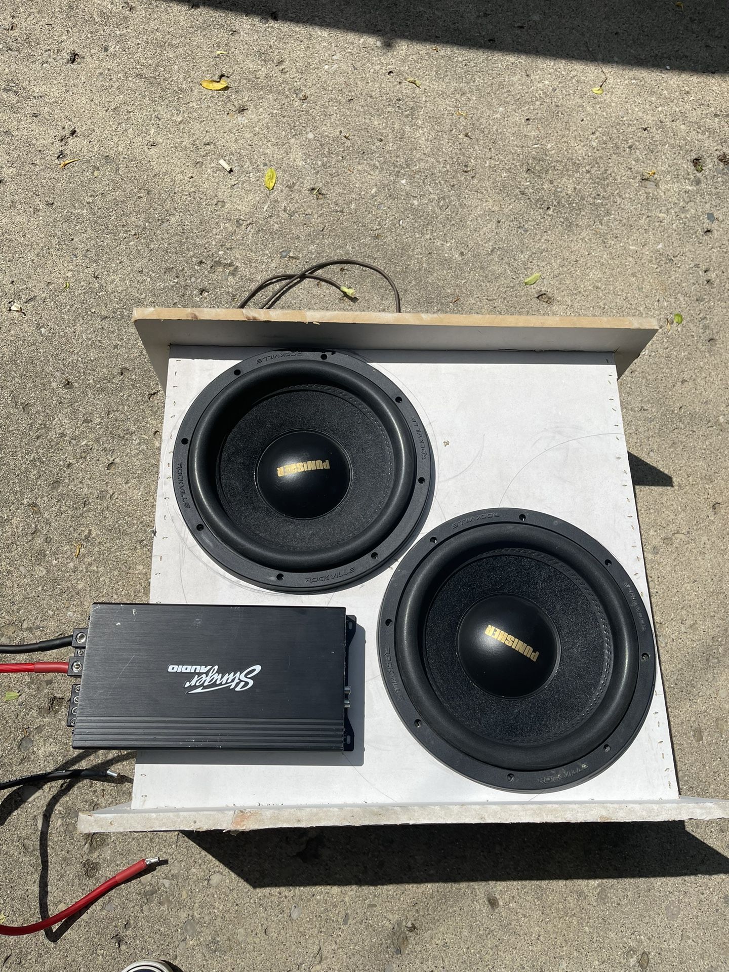 Two Rockville Punisher, 12 Inch Subwoofers And Stinger 2000 W Amp