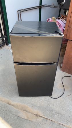 Black mini fridge with freezer