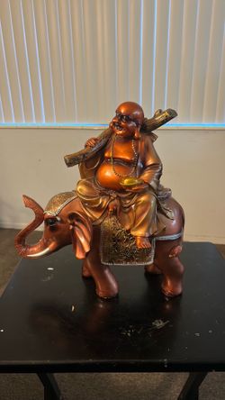Laughing Buddha on a Elephant Figurine