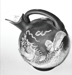 Vintage Japanese moriage raised‑dragon ceramic pitcher. Embossed dragon and cloud details, dark gradient finish. Measures 7 inches high, 6 inches diam
