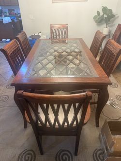 Dining Room Set with glass top including six(6) chairs