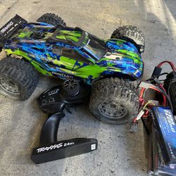 Traxxas Rustler 4x4 VXL Brushless RC Car Battery And Charger Bundle