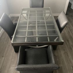 Modern Glass Top Dining Table with 4 Rolling Chairs