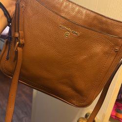 Brown cross body Mk purse