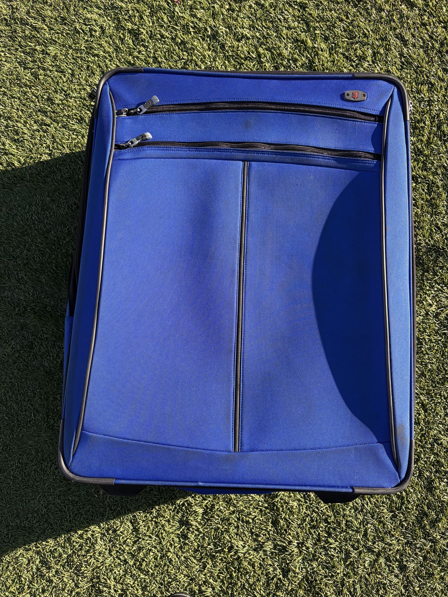 Large checked suitcase