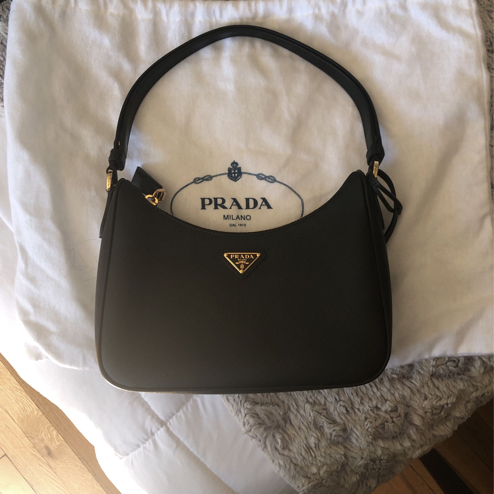 NEW ZIPPERED PRADA CLUTCH WITH CERT OF AUTHENTICITY for Sale in Denver, CO  - OfferUp
