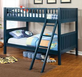 Blue twin over twin bunk bed