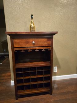 20 bottle Walnut Wine Bar Cabinet
(Champaign bottle from strip club not included 😂)