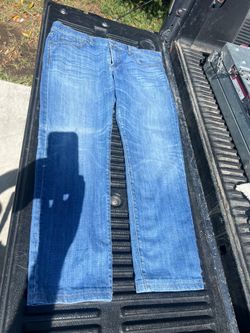 7 For All Mankind light wash denim jeans 36x28 brown leather branded patch