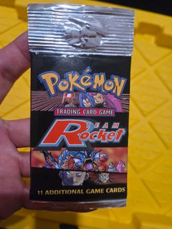 Pokémon Team Rocket Unlimited Long Crimp Booster pack.