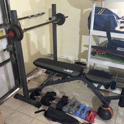 Weight Bench And Assorted Weights Etc.
