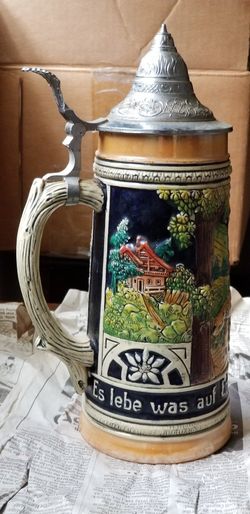 Antique German Stein. 11"heighth X 4.25" wide