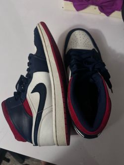 Size 8.5 Nike Air Jordan 1 Mid SE 'Olympic' sneakers, featuring a navy, white, and red color