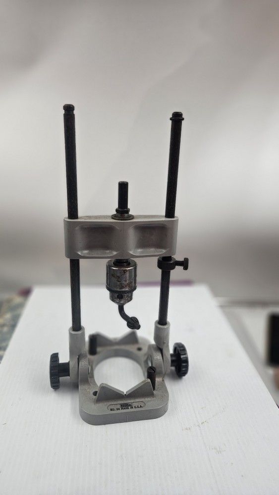 General purpose precision drilling guide with drill chuck