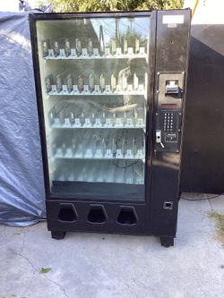 Dixie Naco Glass Front Vending Machine.