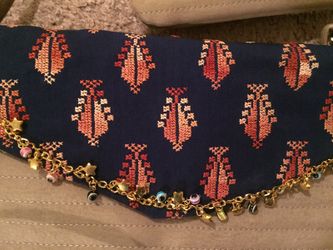 Leather handbags with hand made cross stitch