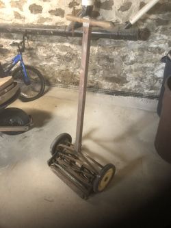 Antique grass cutter