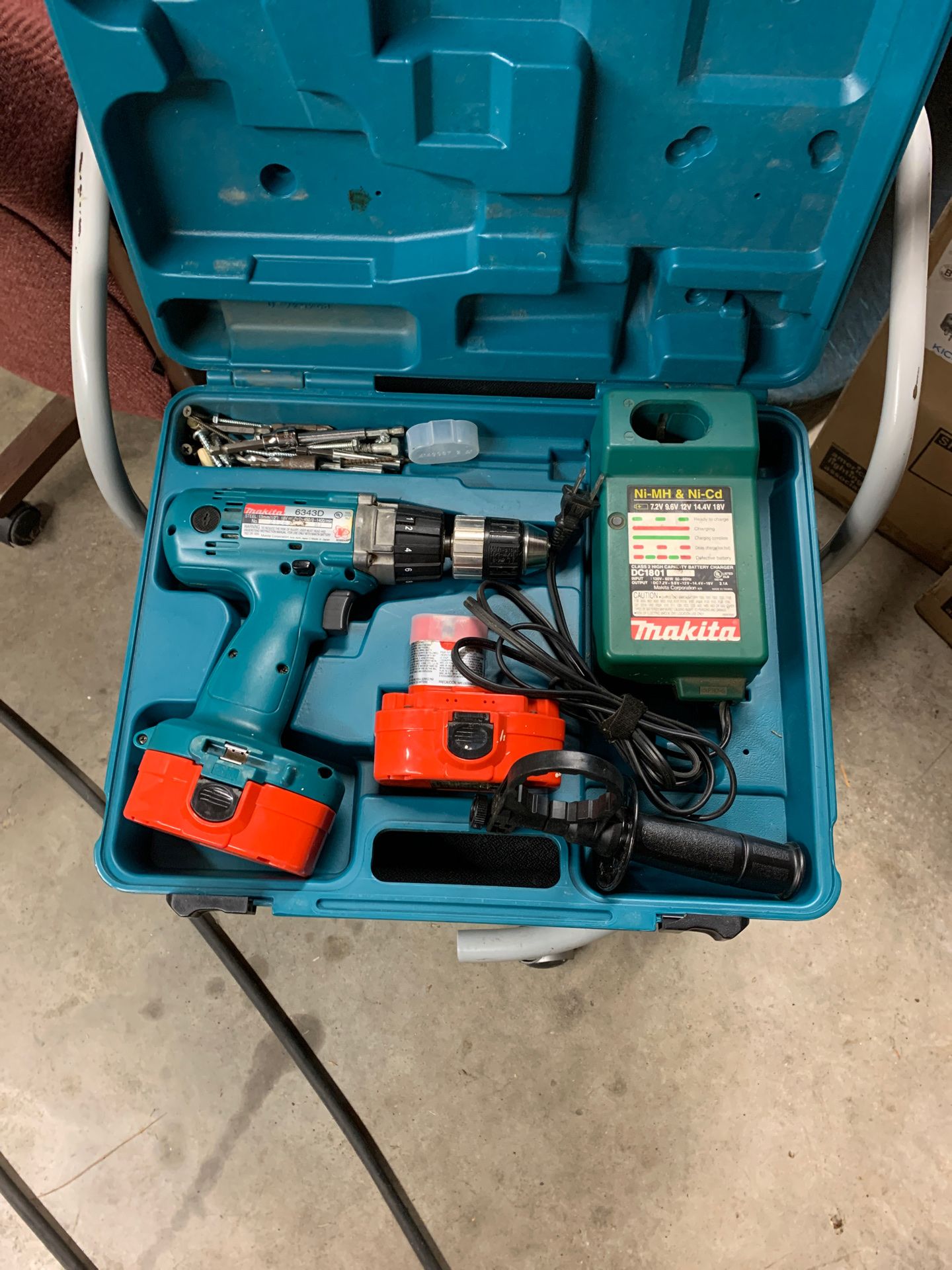 Makita 18 volt drill with 2 batteries and charger in a hard case