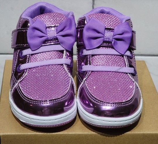 Purple Toddler Glitter Light-Up Shoes With Velcro Straps
$10 each (four available in size 7)