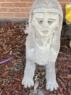 Two cement outdoor Great Sphinx of Giza.