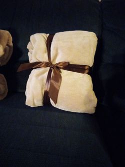 TAN THROW BLANKET