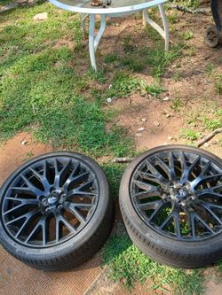 Mustang rim and tires  in good condition