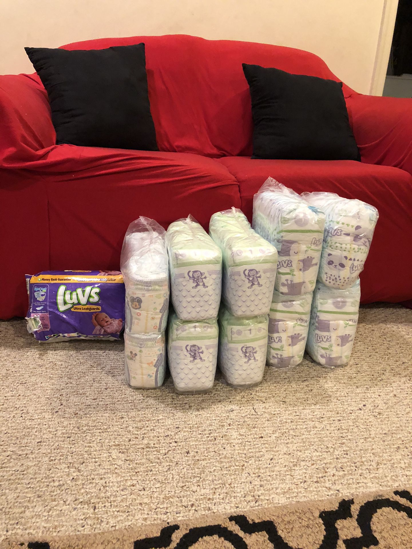 300 Diapers (various sizes)