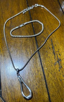 Necklace and bracelet with pendant