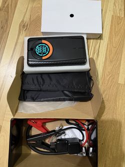 Tire inflator with jump starter